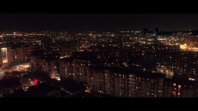 Video Reference: Atmosphere, Building, Sky, Tower block, Electricity, Atmospheric phenomenon, Dusk, Urban design, Landscape, Skyscraper