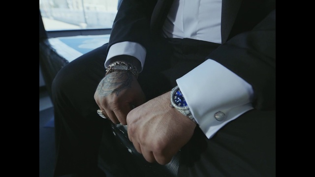 Video Reference: Watch, Dress shirt, Sleeve, Gesture, Elbow, Collar, Dress, Nail, Wrist, Comfort