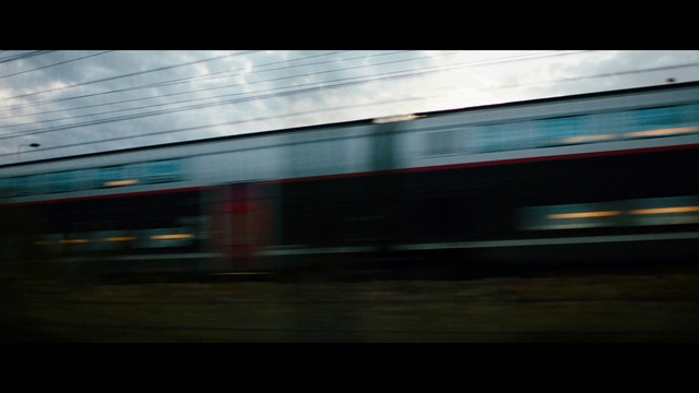 Video Reference: Cloud, Train, Sky, Automotive lighting, Rolling stock, Rolling, Railway, Building, Track, Vehicle