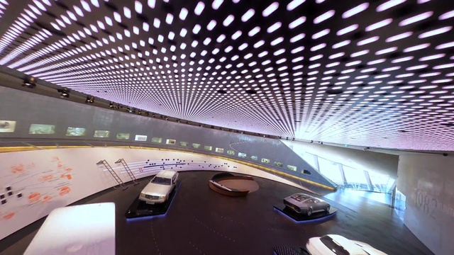 Video Reference: Building, Automotive design, Lighting, Architecture, Field house, Line, Vehicle, Ceiling, Glass, Event