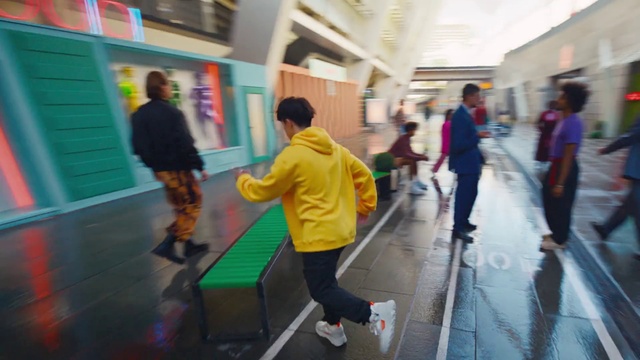 Video Reference: Footwear, Trousers, Shoe, Leg, Green, Infrastructure, Luggage and bags, Building, Bag, Flooring