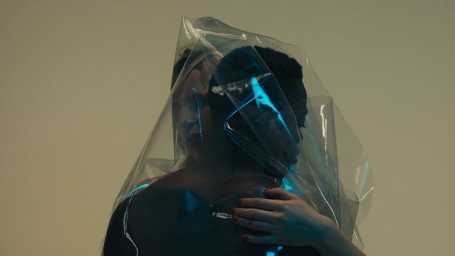 Video Reference: Neck, Sleeve, Eyewear, Gadget, Art, T-shirt, Personal protective equipment, Electric blue, Fashion design, Feather