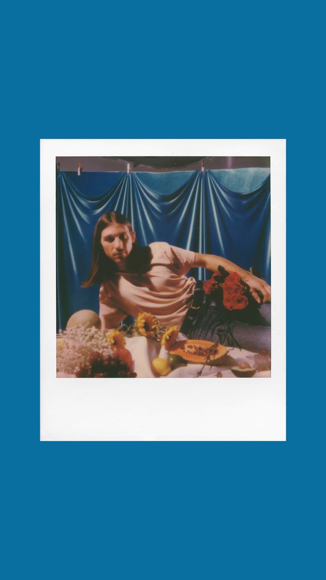 Video Reference: Art, Rectangle, Font, Electric blue, Wrist, Painting, Visual arts, Sitting, Leisure, Peach