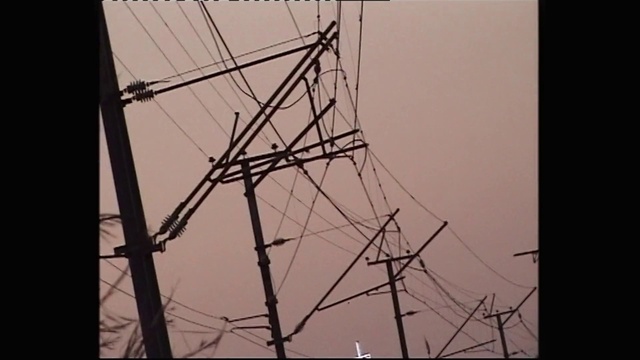 Video Reference: Sky, Tower, Electricity, Transmission tower, Overhead power line, Triangle, Parallel, Electrical wiring, Wire, Electrical supply
