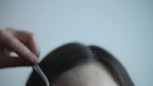 Video Reference: Hair, Hand, Arm, Eye, Eyelash, Neck, Gesture, Eyewear, Finger, Audio equipment