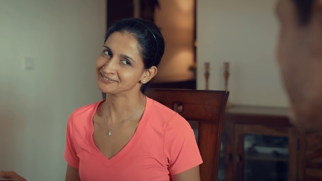 Video Reference: Smile, Sleeve, Flash photography, Chair, Event, Jewellery, Eyelash, Fashion design, Necklace, Room