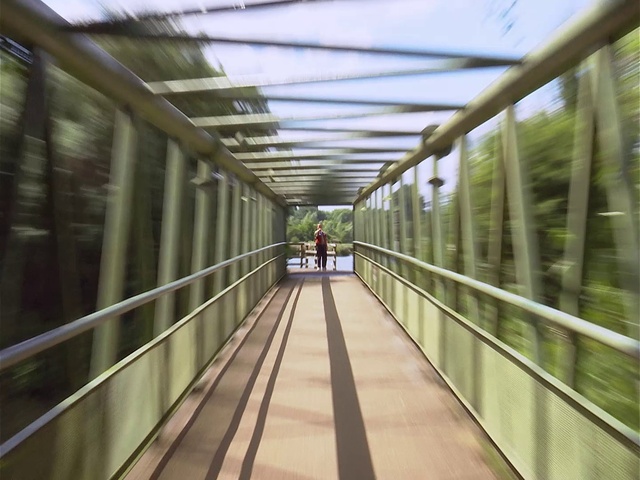 Video Reference: Symmetry, City, Metal, Walkway, Bridge, Sky, Glass, Handrail, Wood, Steel