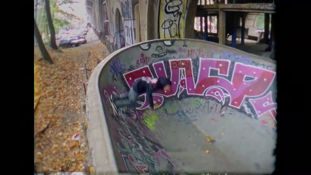 Video Reference: Motor vehicle, Graffiti, Font, Art, Automotive exterior, Window, City, Road, Mural, Event