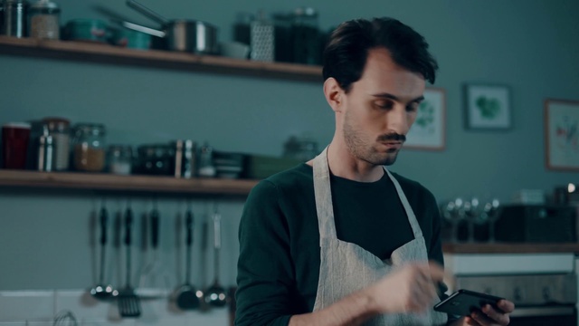 Video Reference: Hair, Flash photography, Beard, Camera, Eyewear, Black hair, T-shirt, Street fashion, Audio equipment, White-collar worker