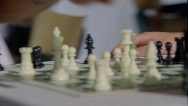 Video Reference: Chess, Board game, Indoor games and sports, Recreation, Wood, Tabletop game, Chessboard, Plastic, Sports equipment, Still life photography