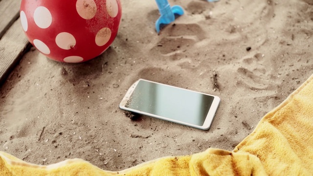 Video Reference: Photograph, White, Light, Textile, Sleeve, Wood, Gadget, Rectangle, Beach, Communication Device