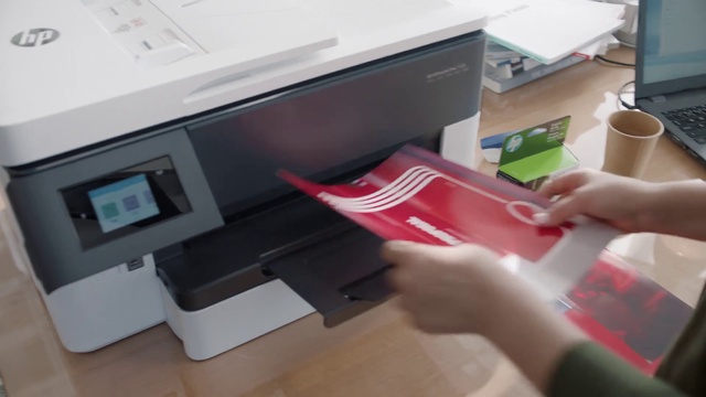 Video Reference: Hand, Tableware, Computer desk, Output device, Office supplies, Gesture, Finger, Office equipment, Gadget, Material property