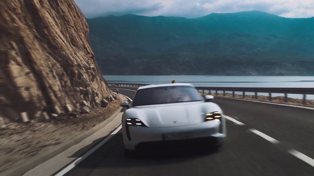 Video Reference: Car, Land vehicle, Sky, Vehicle, Mountain, Tire, Cloud, Automotive lighting, Hood, Motor vehicle