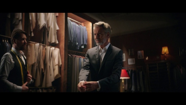 Video Reference: Coat, Flash photography, Sleeve, Gesture, Collar, Formal wear, Blazer, Event, Tie, Suit