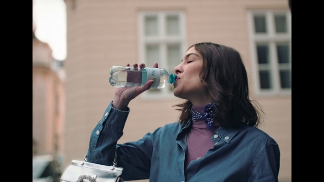 Video Reference: Hair, Water, Window, Human, Drinkware, Street fashion, Water bottle, Happy, Drink, Drinking