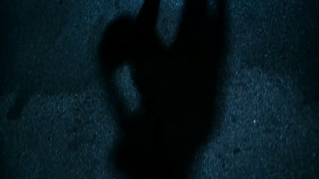Video Reference: Leg, Human body, Gesture, Grey, Road surface, Tints and shades, Asphalt, Electric blue, Human leg, Darkness