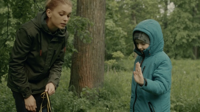 Video Reference: Outerwear, Plant, People in nature, Green, Wood, Tree, Natural landscape, Grass, Biome, Woody plant