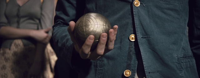 Video Reference: Hand, Dress shirt, Sleeve, Gesture, Ball, Collar, Finger, Sports equipment, Blazer, Wood