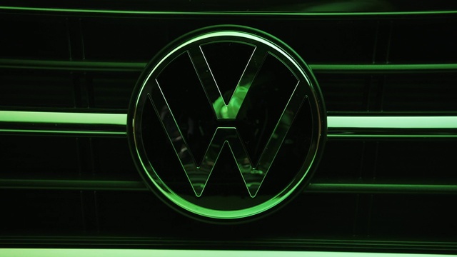 Video Reference: Green, Automotive design, Motor vehicle, Font, Vehicle, Symmetry, Neon, Automotive lighting, Symbol, Emblem