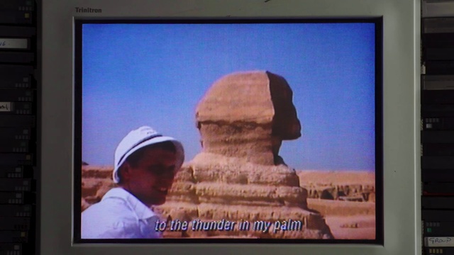 Video Reference: Display device, Landscape, Rock, Art, Font, Rectangle, Visual arts, Projection screen, Travel, History