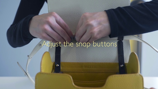 Video Reference: Hand, Light, Automotive design, Sleeve, Yellow, Motor vehicle, Gesture, Finger, Tire, Line