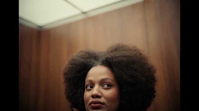 Video Reference: Forehead, Nose, Lip, Jheri curl, Flash photography, Afro, Lipstick, Black hair, Tints and shades, Fashion design