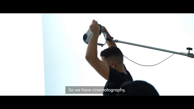 Video Reference: Hand, Gesture, Elbow, Font, Audio equipment, Recreation, Flash photography, Entertainment, Wrist, Balance