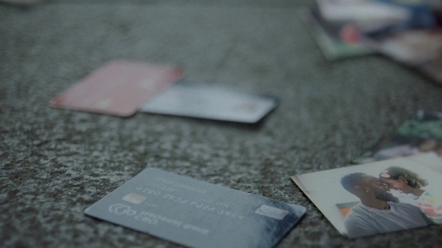 Video Reference: Grey, Font, Wood, Flooring, Road surface, Event, Paper, Asphalt, Paper product, Sidewalk