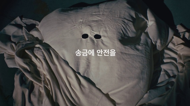 Video Reference: Outerwear, Textile, Sleeve, Grey, T-shirt, Font, Linens, Pattern, Personal protective equipment, Logo