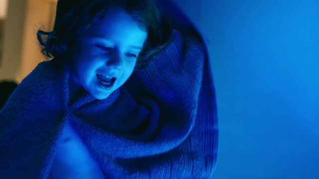 Video Reference: Lip, Outerwear, Smile, Blue, Flash photography, Eyelash, Gesture, Happy, Aqua, Entertainment