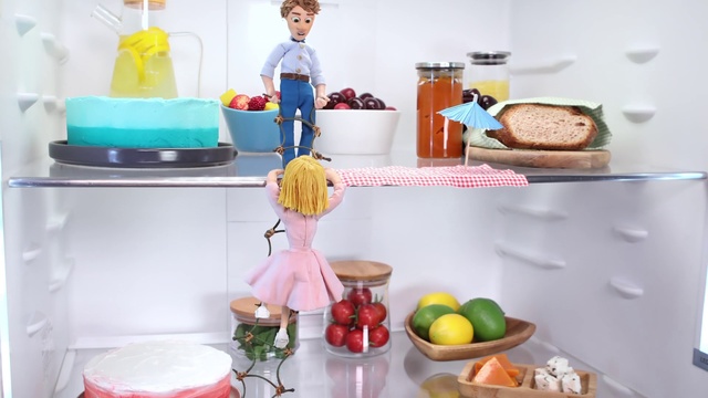 Video Reference: Food, Blue, Orange, Yellow, Toy, Tableware, Shelving, Shelf, Cake decorating supply, Sugar cake