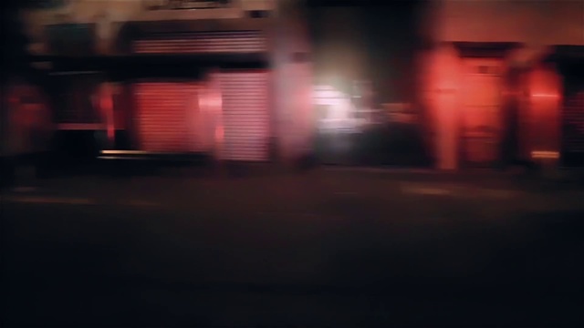 Video Reference: Automotive lighting, Road surface, Asphalt, Floor, Flooring, Gas, Tints and shades, City, Magenta, Road