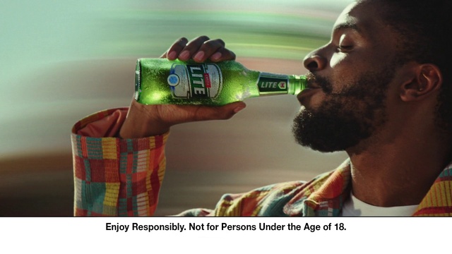 Video Reference: Bottle, Food, Gesture, Beard, Alcoholic beverage, Drink, Drinking, Alcohol, Tartan, Event