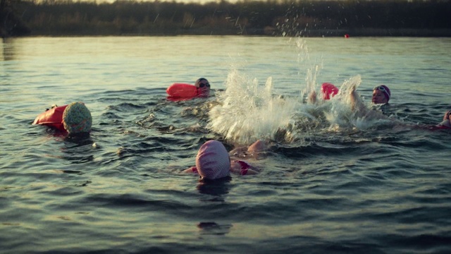 Video Reference: Water, Outdoor recreation, Lake, Headgear, Quadrathlon, Leisure, Personal protective equipment, Sports, Recreation, Swim cap