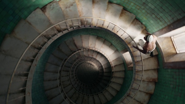 Video Reference: Stairs, Automotive tire, Building, Automotive wheel system, Fixture, Spiral, Symmetry, Art, Circle, Auto part