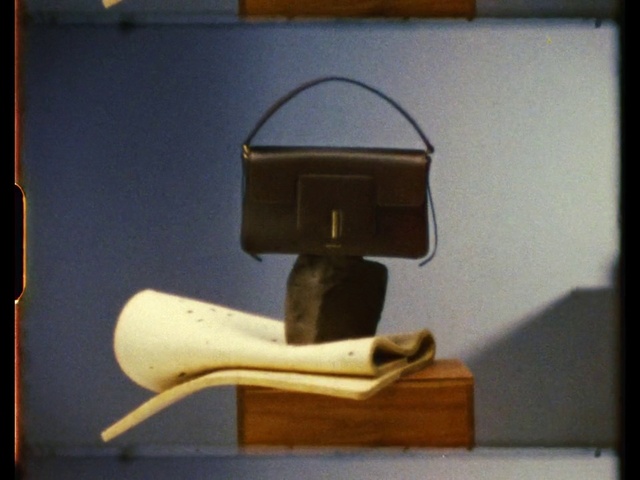 Video Reference: Wood, Shelving, Rectangle, Wood stain, Chair, Lamp, Plywood, Font, Metal, High heels