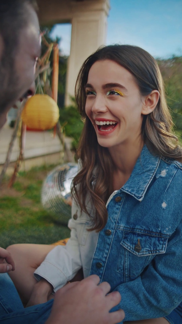 Video Reference: Clothing, Face, Smile, Facial expression, Tableware, Fashion, Happy, People in nature, Style, Grass