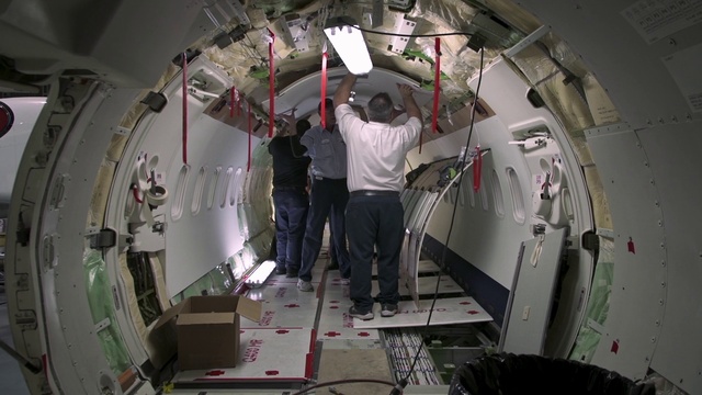 Video Reference: Trousers, Sleeve, Engineering, Circle, Flash photography, Space, Aerospace engineering, Science, Ceiling, Machine