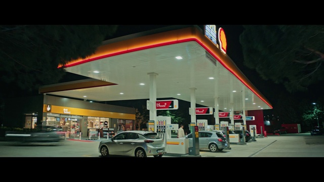 Video Reference: Automotive parking light, Car, Filling station, Gas pump, Automotive lighting, Vehicle, Gasoline, Building, Wheel, Tire