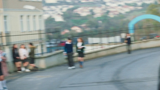 Video Reference: Shorts, Asphalt, Road surface, Atmospheric phenomenon, Fence, Leisure, Thoroughfare, Morning, Sidewalk, Racing