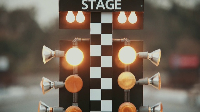 Video Reference: Amber, Orange, Font, Material property, Urban design, Symmetry, Circle, Wood, Art, Indoor games and sports