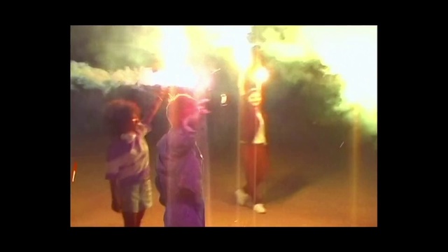 Video Reference: Dress, Performing arts, Heat, Event, Display device, Entertainment, Art, Darkness, Magenta, Fun