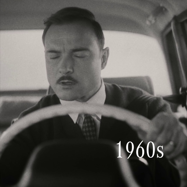 Video Reference: Face, Hand, Eyebrow, Automotive design, Jaw, Eyewear, Motor vehicle, Flash photography, Tie, Gesture