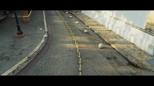 Video Reference: Road surface, Asphalt, Automotive tire, Thoroughfare, Wall, Tar, Parallel, Sidewalk, Composite material, Tints and shades