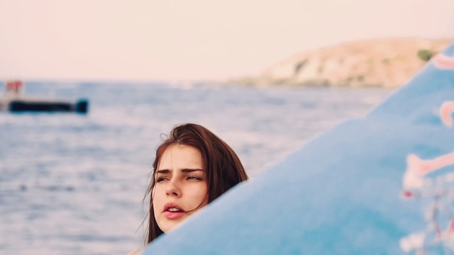 Video Reference: Hair, Face, Head, Water, Sky, Eye, People in nature, Azure, Flash photography, People on beach