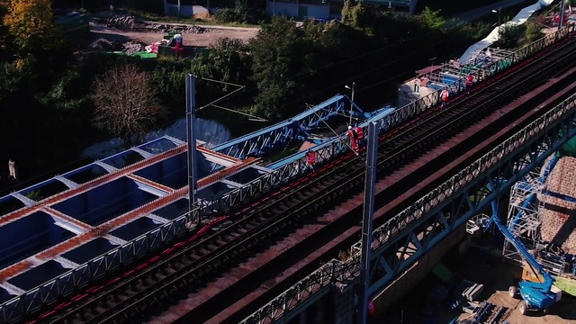 Video Reference: Wheel, Architecture, Urban design, Tree, Rolling, Rolling stock, Leisure, Slope, Locomotive, Railway