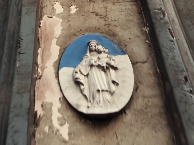 Video Reference: Artifact, Wood, Creative arts, Art, Font, Circle, Concrete, Natural material, History, Symbol