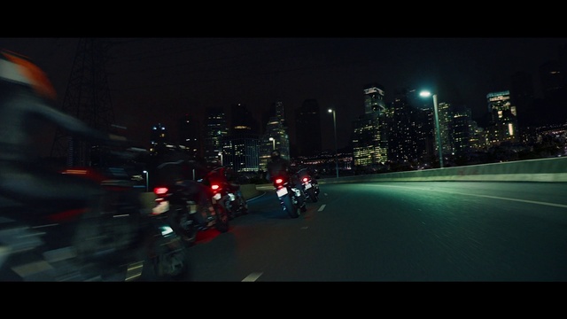 Video Reference: Automotive lighting, Building, Asphalt, Skyscraper, Road surface, Automotive mirror, Sky, Vehicle, Tire, Automotive design