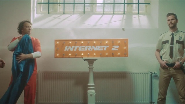 Video Reference: World, Green, Standing, Architecture, Wall, Font, Flooring, Event, Lectern, Presentation