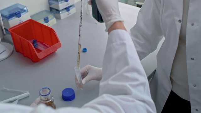 Video Reference: Hand, Safety glove, Glove, Sleeve, Research, White coat, Finger, Laboratory equipment, Service, Chemistry